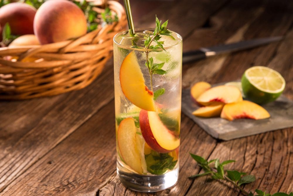 photo of a peach mojito cocktail