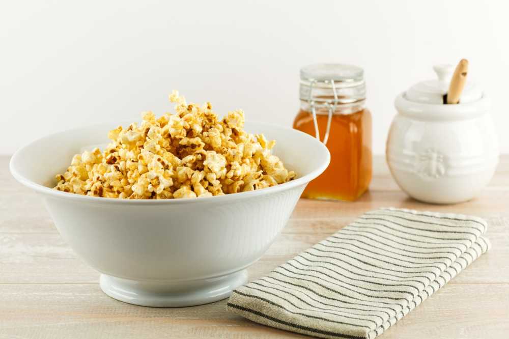 Make your movie night or game day is complete with this Sweet & Spicy Honey Popcorn, with just the right amount of heat and sweet to be completely addictive.