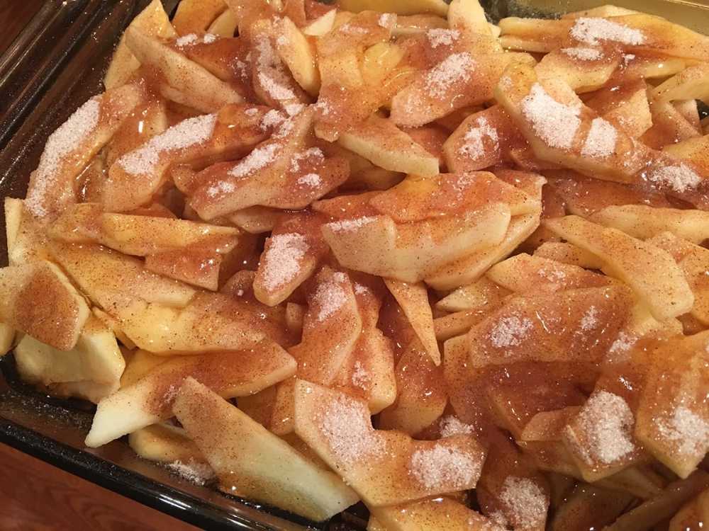 Fresh apples, sprinkled with cinnamon and nutmeg are some of the key ingredients in this Honey Apple Crisp from Christmas Cake Murder, a Hannah Swensen mystery.