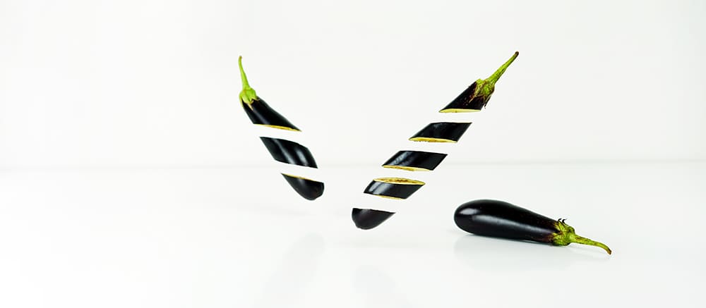 Once home, store eggplant whole – skin on - in refrigerator and when cutting, use a stainless steel - not carbon steel - knife because carbon steel causes eggplant to turn black.